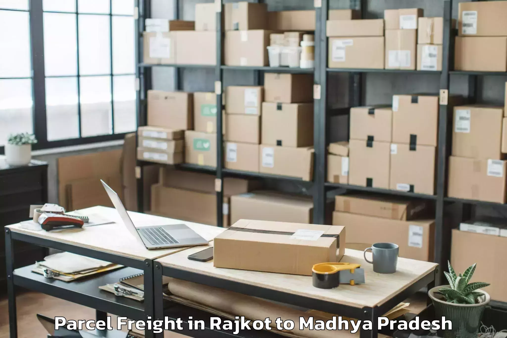 Rajkot to Lashkar Parcel Freight Booking